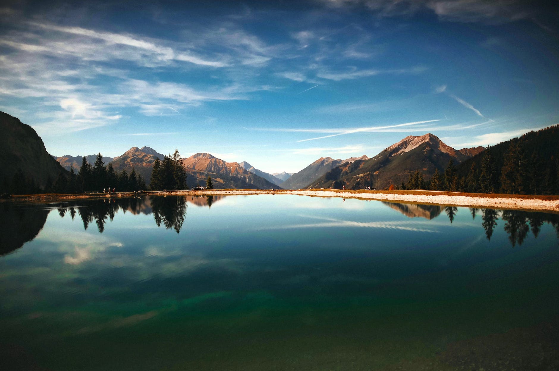 body of water near mountain